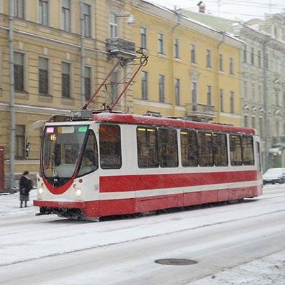 STREETCAR, RAILS, WIRES, CITY, STOP, PASSENGERS, SNOW, ELECTRICITY, TRAFFIC