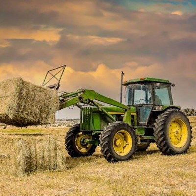 TRACTOR, FIELD, AGRICULTURE, HARVEST, WHEELS, FARMER, HAY, BALE, CLOUDS, LIFT, GREEN, YELLOW