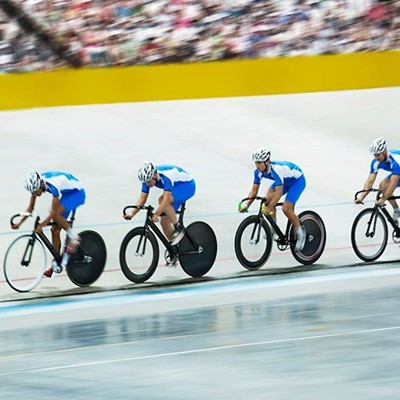 VELODROME, SPORT, TEAM, TRACK, MOMENTUM, BICYCLES, HELMET, SPECTATORS, POWER, SPEED, ATHLETES