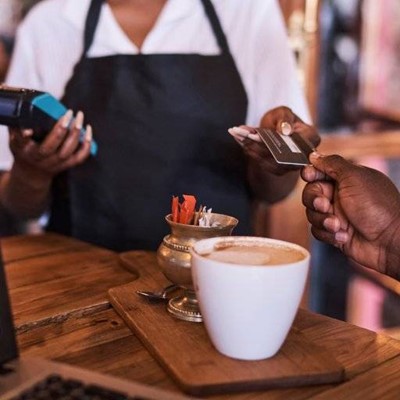 MUG, BOARD, FINGERNAILS, APRON, PAYMENT, CARD, SHIRT, COFFEE, TEASPOON, SERVER, TRANSACTION, SUGAR