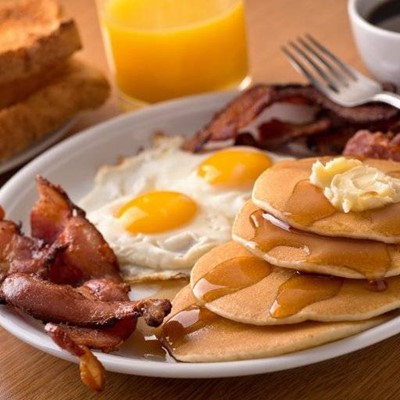 GLASS, FORK, CRISPY, PANCAKES, BUTTER, PLATE, TOAST, JUICE, COFFEE, BACON, EGGS, SYRUP